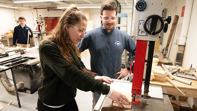 Freedom by Design members work in the Cummings School of Architecture's wood shop.