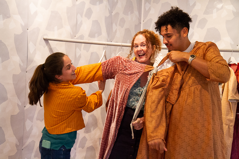 People dress in costume, as part of interactive art piece.