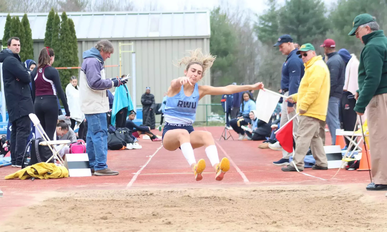 Victoria Bettencourt competes in the long jump.