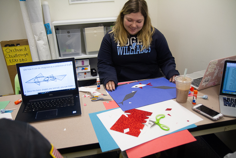 Student doing art project.
