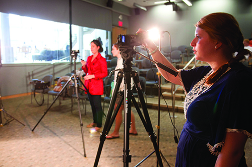 Students filming through cameras
