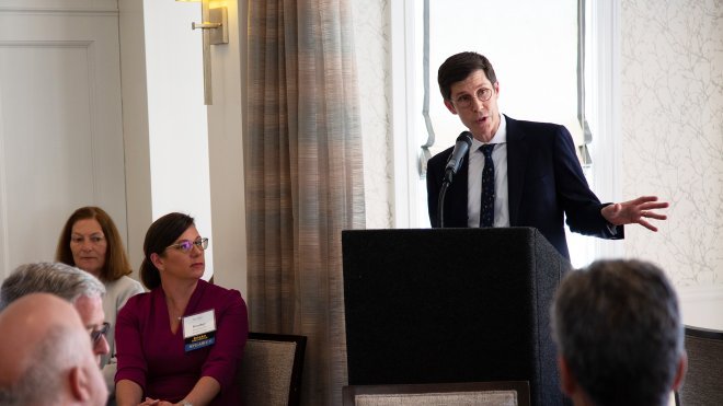 Providence Mayor Brett Smiley speaks at Roger Williams University’s inaugural Real Estate Symposium in 2023.
