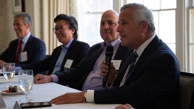 Joseph Paolino, Jr. addresses the audience during a panel discussion titled, “New paradigms within the built environment: Opportunities and challenges for homes, marketplaces and office spaces.”