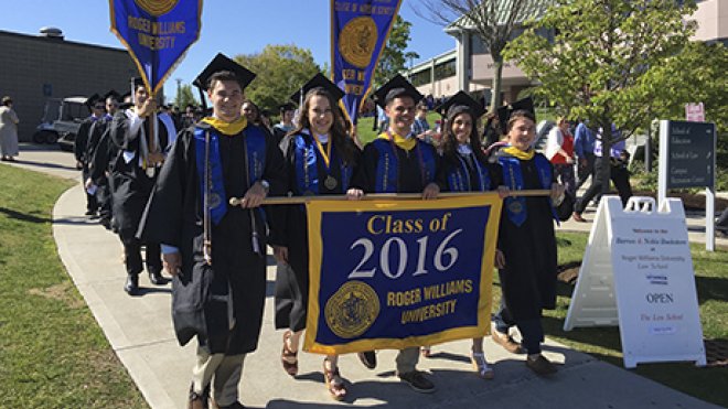 Graduates process to commencement exercises.