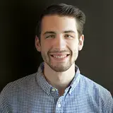 A headshot of Nick Corey