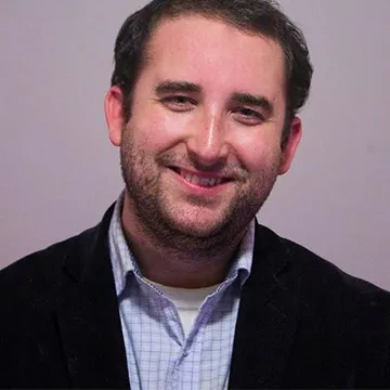 A headshot of Phil Devitt