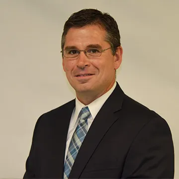A headshot of Sean Varano