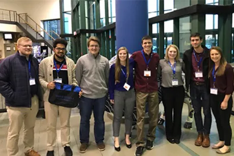 Students posing at competition.