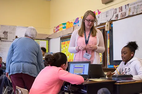 Elise Frank '17 works with students at George J. West Elementary School