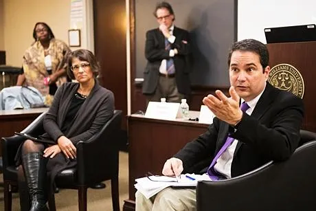 Law professors share their expert opinions during program.