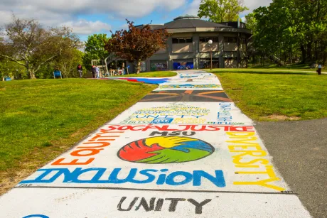 Messages painted by students on the Unity Walkway on the Bristol campus