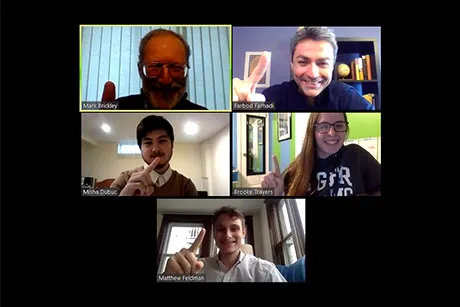Students and professors celebrate the news of their win on Zoom.