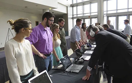 Students present their work at showcase.