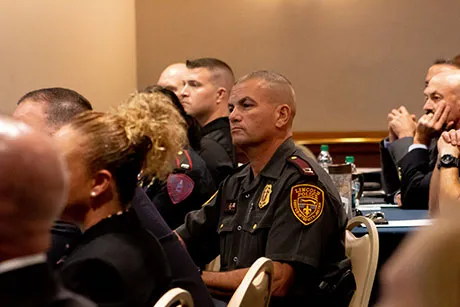 R.I. State Police members listen as the initiative is unveiled.