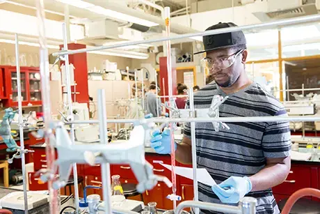 Student working in chemistry lab.