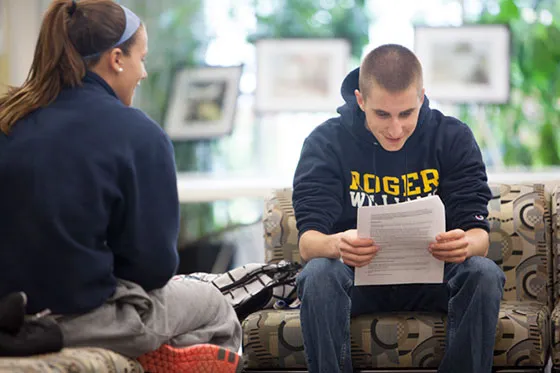 Student reading in library.