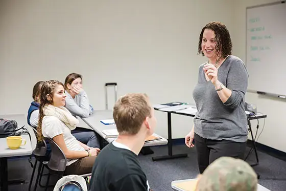 Professor lecturing in class.