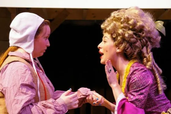 Two performers in a play.