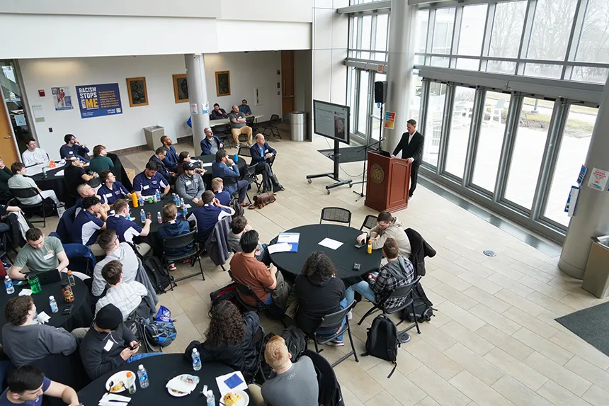 Allan Ramella speaks to student teams and industry professionals.