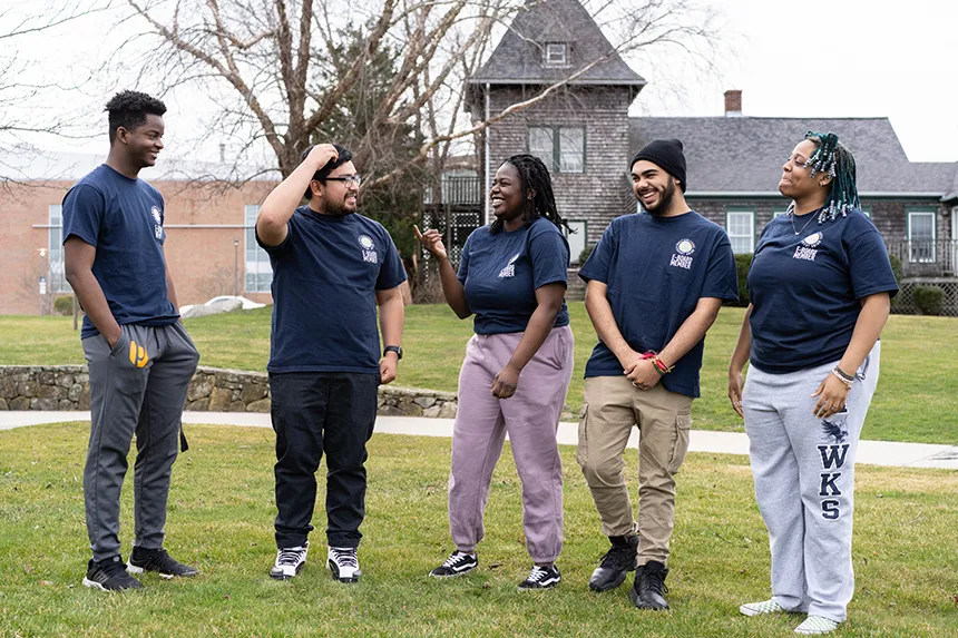 MSU e-board members share a laugh outside after a meeting.