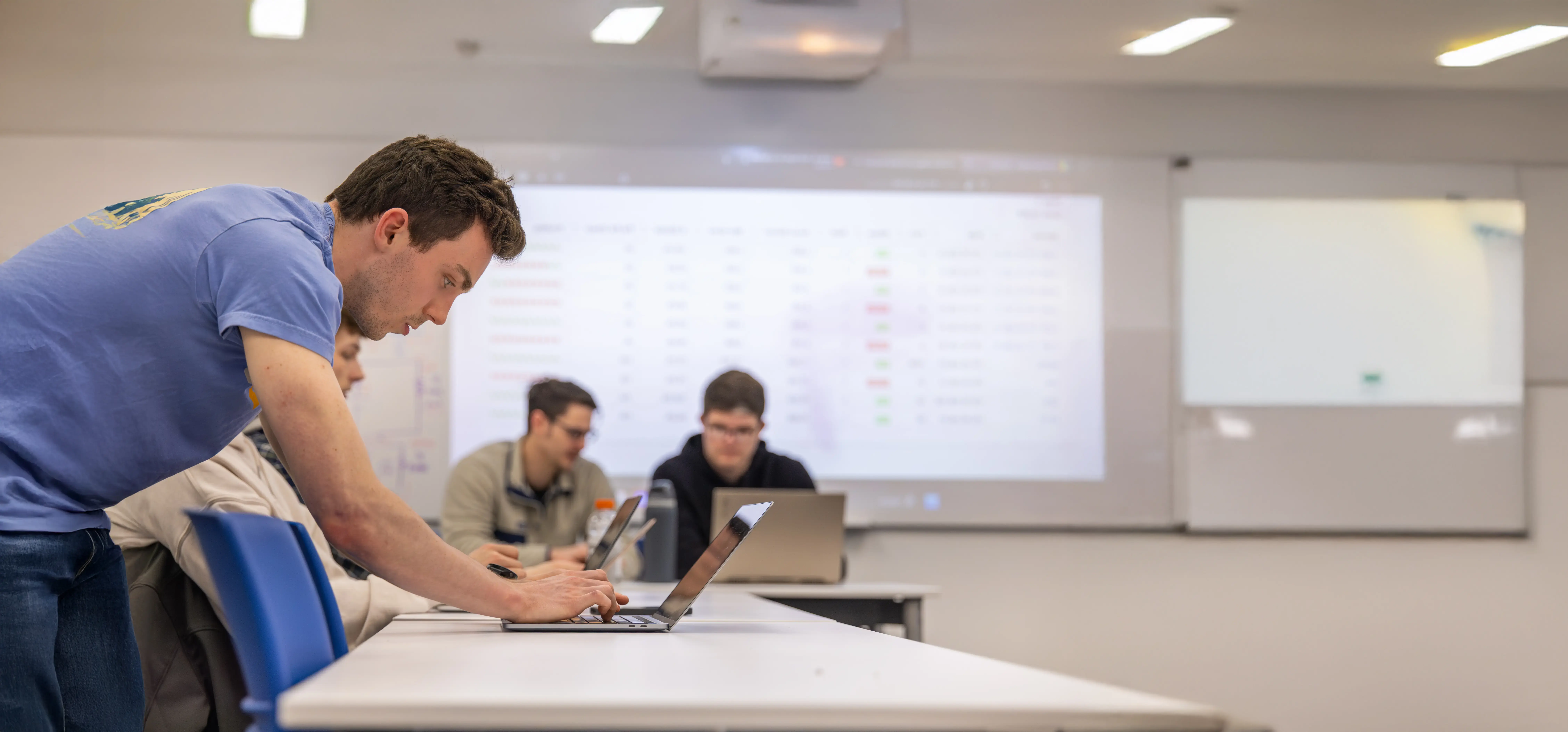 A cybersecurity student works to fight off a cyber attack